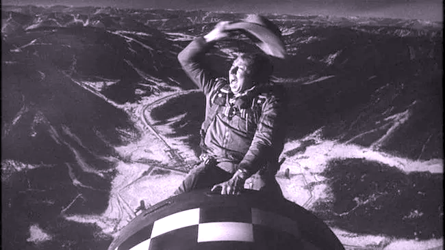 Film still of Major Kong riding a nuclear bomb from Dr. Strangelove, referencing the event title